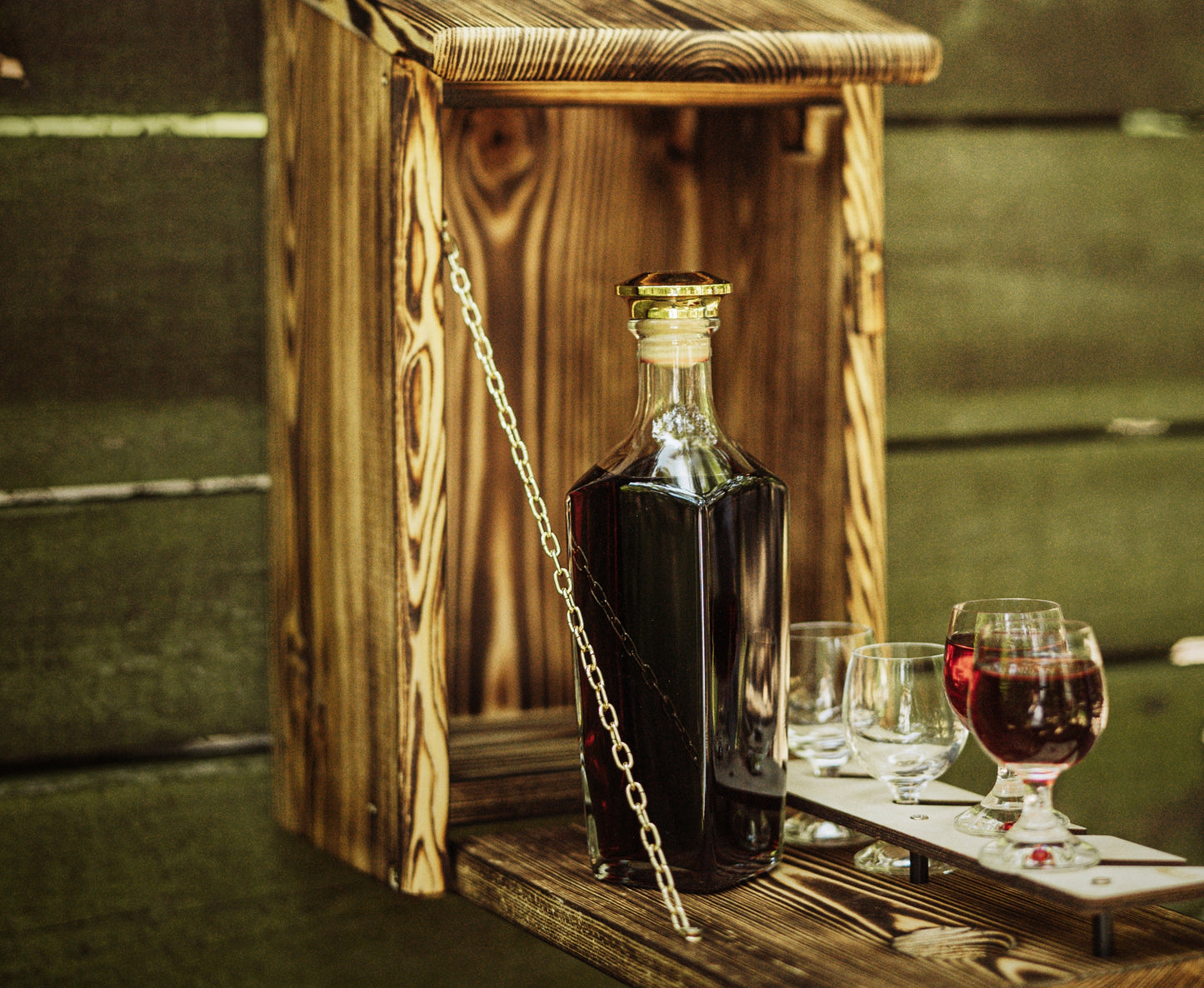 Wooden birdhouse with liquor minibar 