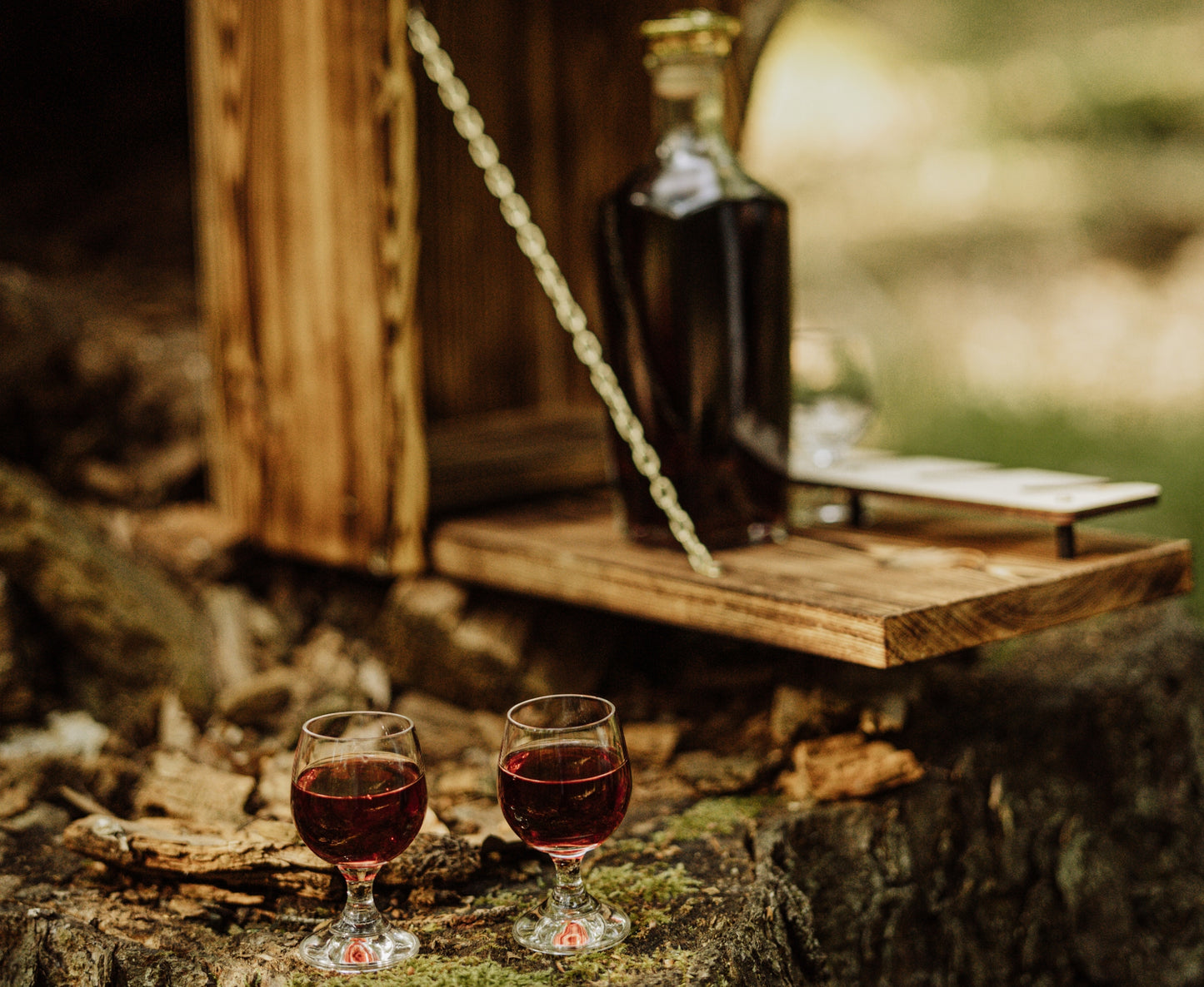 Wooden birdhouse with liquor minibar 